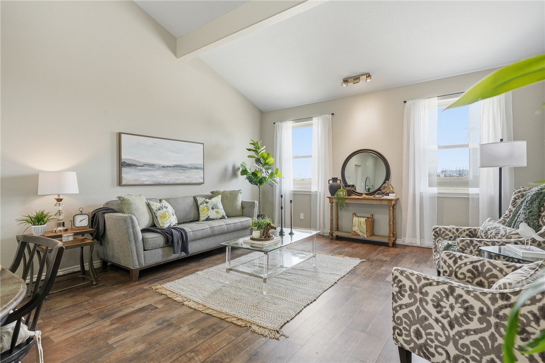 4642 Lackey Taft, TX 78390 - Photo 10 of 40 a living room with furniture a couch and a potted plant