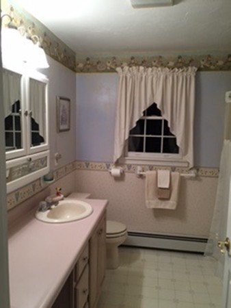 9 Beaman Road Sterling, MA 01564 - Photo 10 of 24 a bathroom with a sink toilet and shower