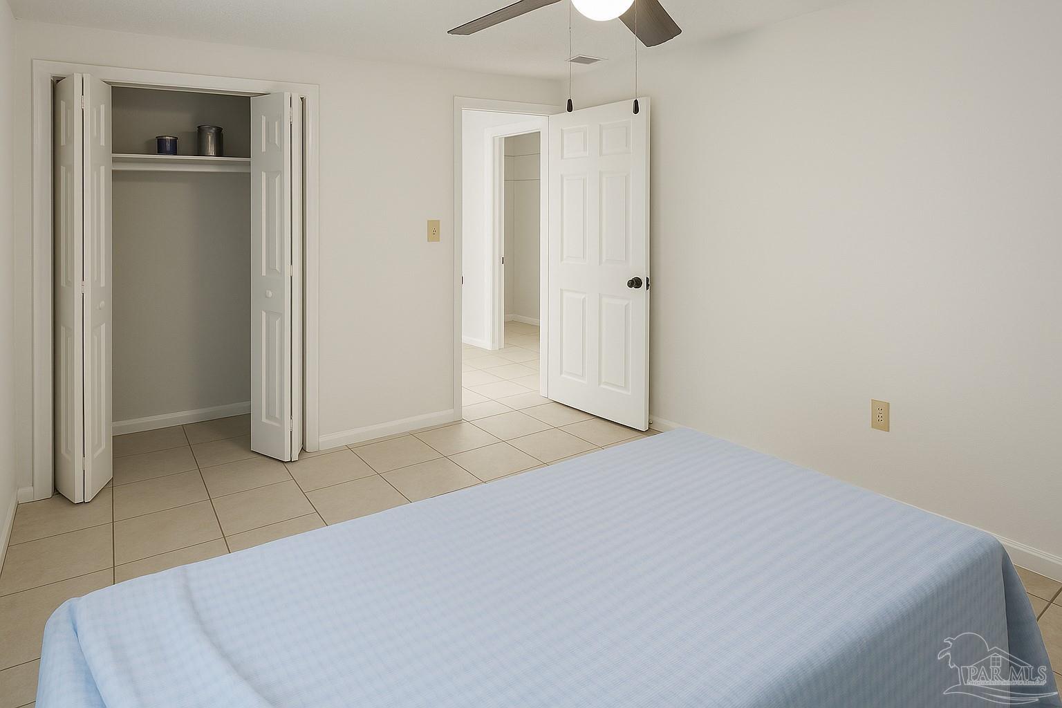 6274 Munson Highway Milton, FL 32570 - Photo 19 of 26 a room with a bed and a shower