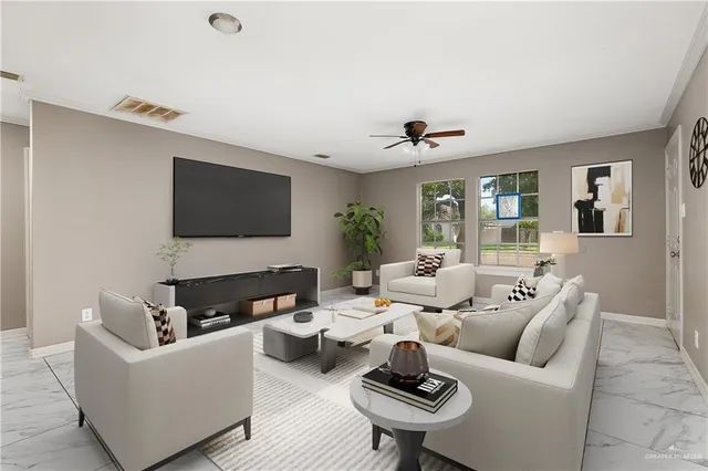 a living room with furniture and a flat screen tv