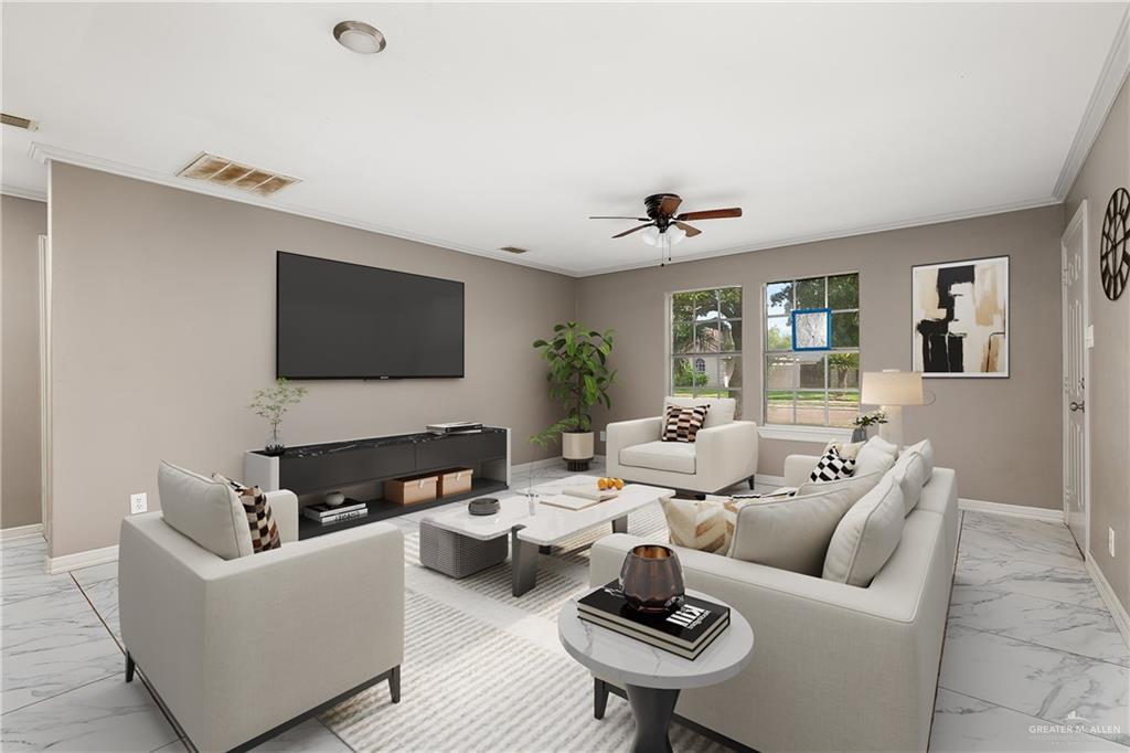3900 Gabriella Drive Weslaco, TX 78599 - Photo 2 of 12 a living room with furniture and a flat screen tv