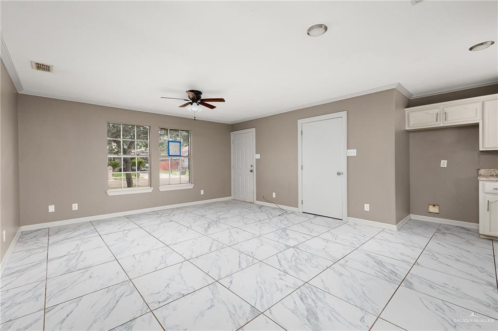 3900 Gabriella Drive Weslaco, TX 78599 - Photo 5 of 12 a view of an empty room with a window