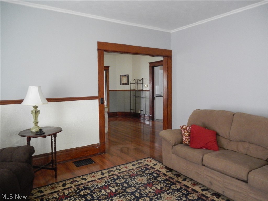 355 South 9th Street Coshocton, OH 43812 - Photo 10 of 35 living room looking into the dining