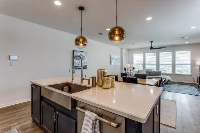 a view of a dining table and chairs in the kitchen