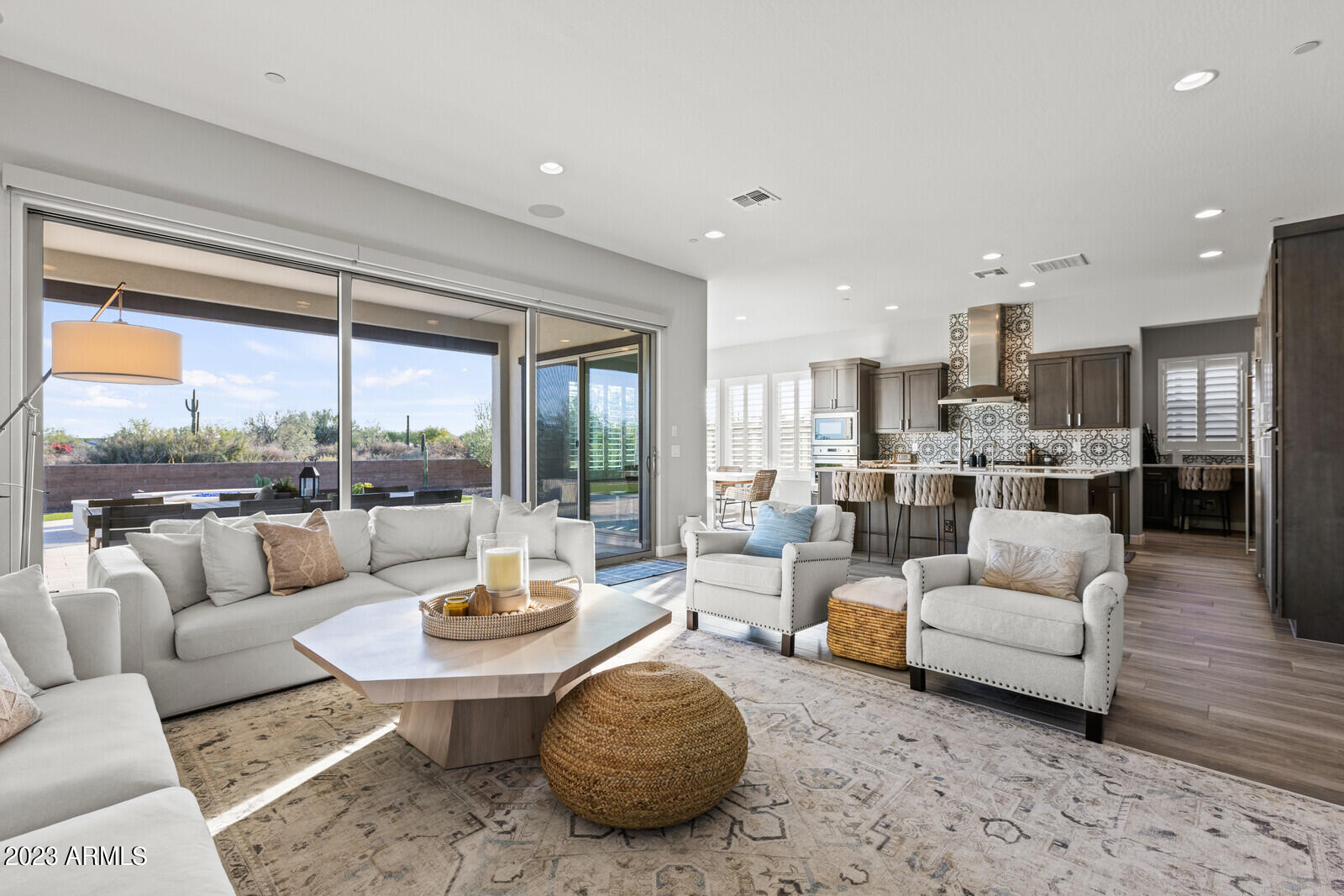 17835 East Cindercone Road Rio Verde, AZ 85263 - Photo 1 of 57 a living room with furniture and a large window