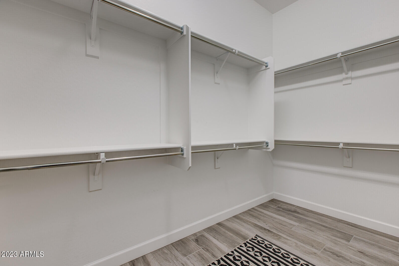 17835 East Cindercone Road Rio Verde, AZ 85263 - Photo 23 of 57 a view of walk in closet with empty racks