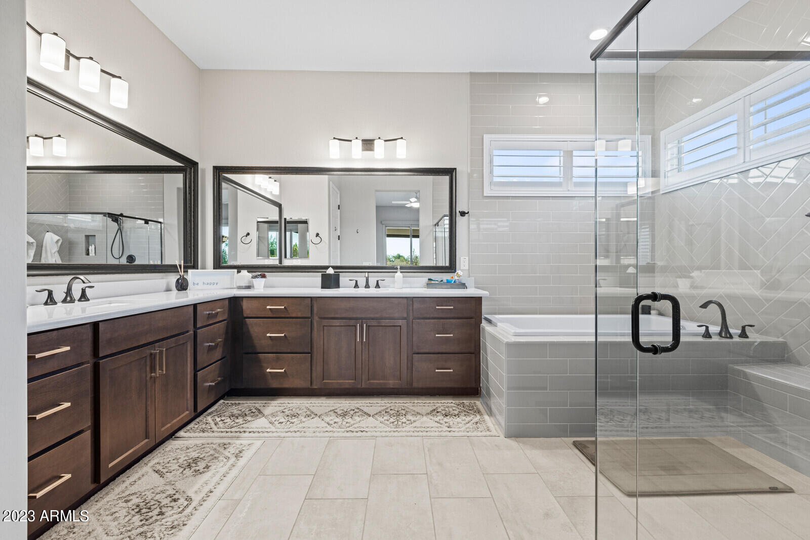 17835 East Cindercone Road Rio Verde, AZ 85263 - Photo 26 of 57 a bathroom with a sink a toilet and mirror