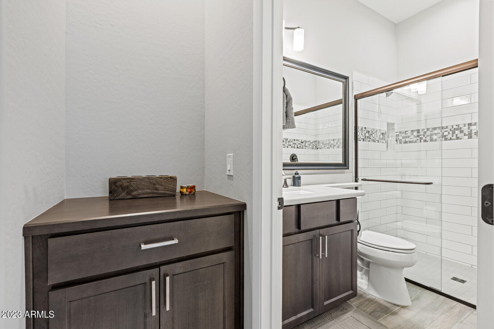 17835 East Cindercone Road Rio Verde, AZ 85263 - Photo 28 of 57 a bathroom with a toilet a sink and a window