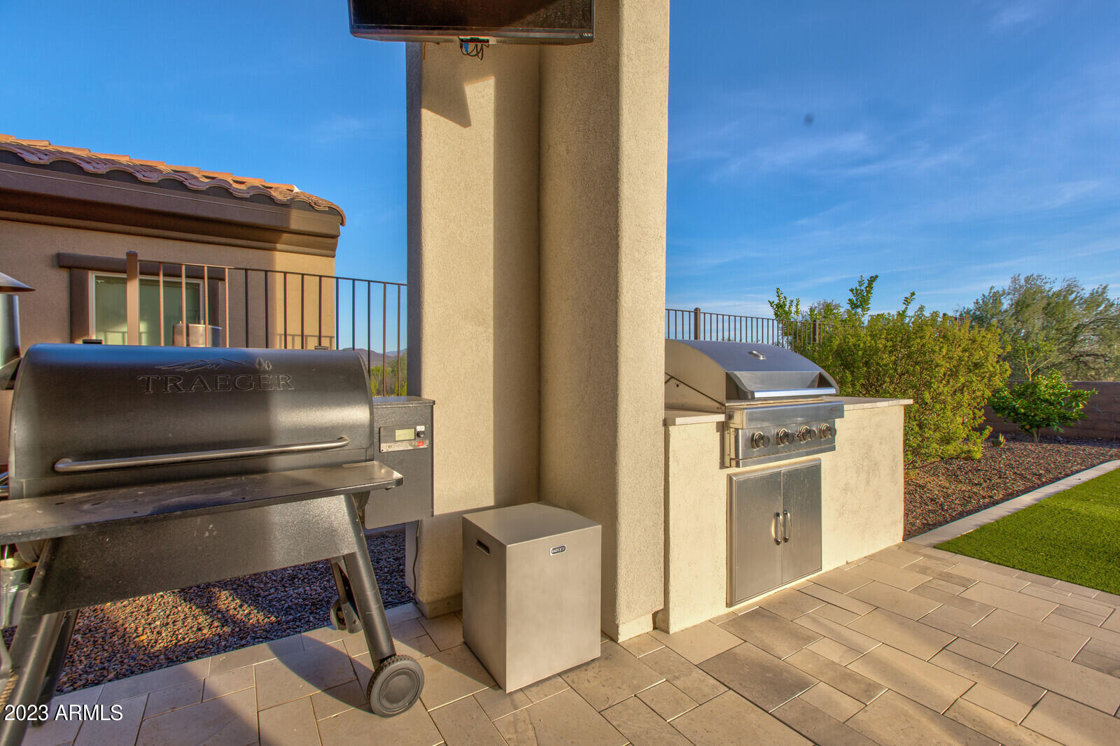 17835 East Cindercone Road Rio Verde, AZ 85263 - Photo 36 of 57 a backyard of a house with table and chairs