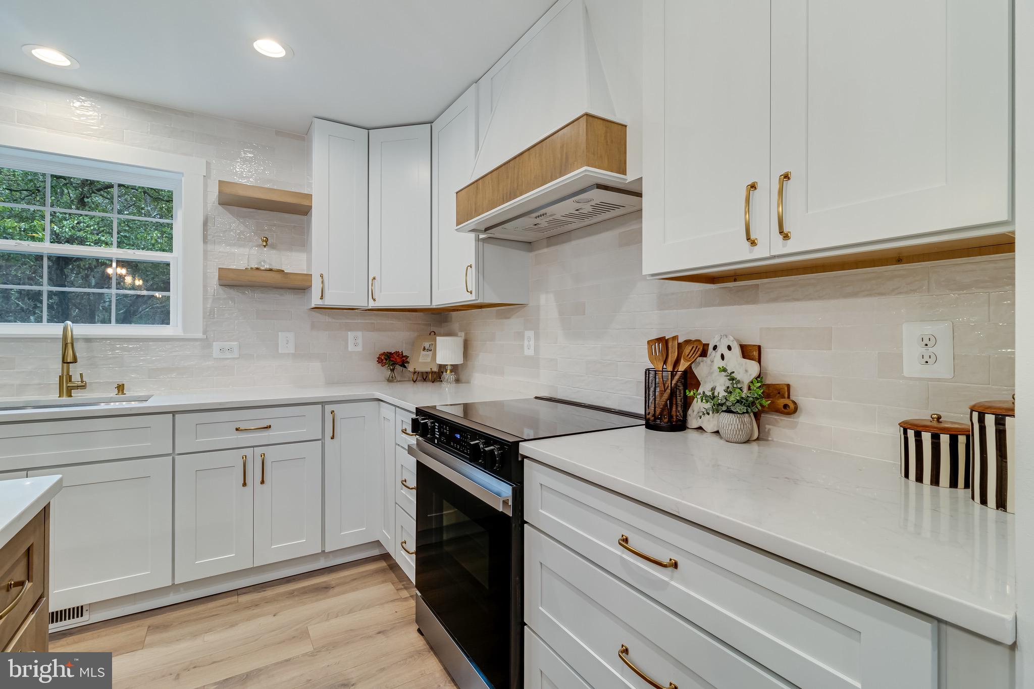 1940 Adelina Road Prince Frederick, MD 20678 - Photo 11 of 37 a kitchen with sink and cabinets
