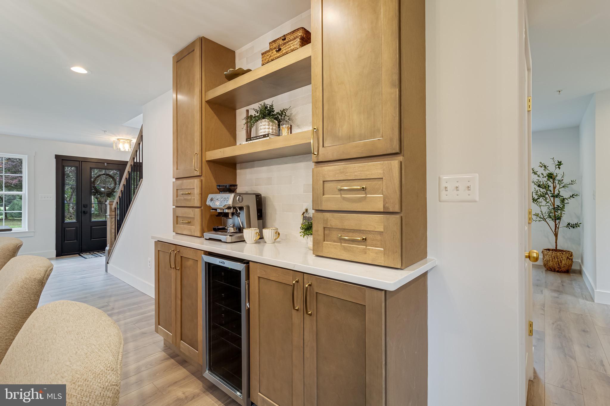 1940 Adelina Road Prince Frederick, MD 20678 - Photo 16 of 37 a kitchen with a sink and cabinets
