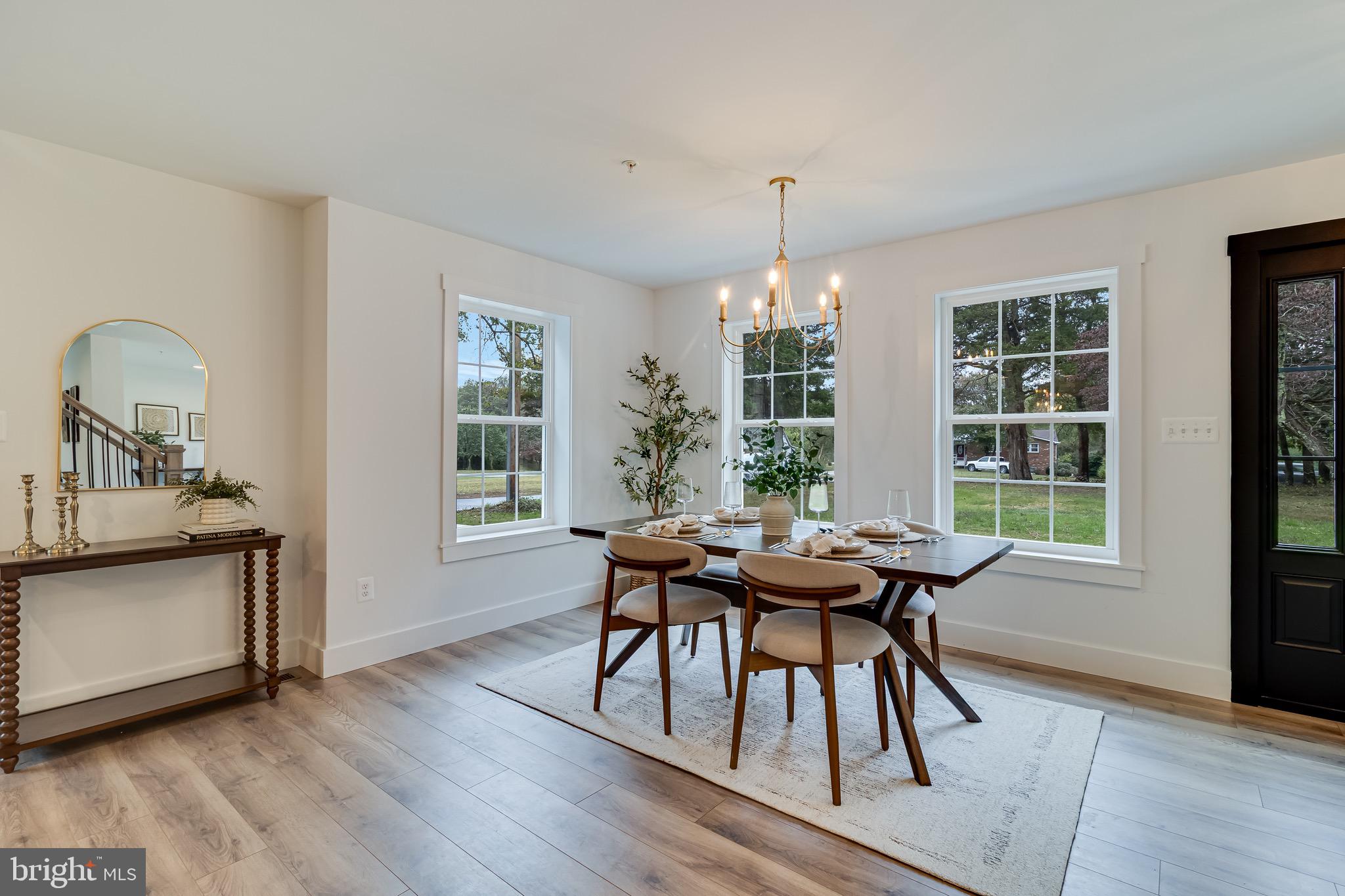 1940 Adelina Road Prince Frederick, MD 20678 - Photo 17 of 37 a view of a dining room with furniture window and outside view