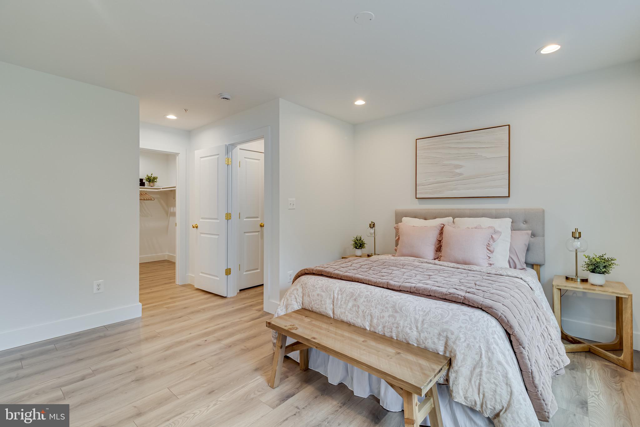 1940 Adelina Road Prince Frederick, MD 20678 - Photo 26 of 37 a bedroom with a bed and a table