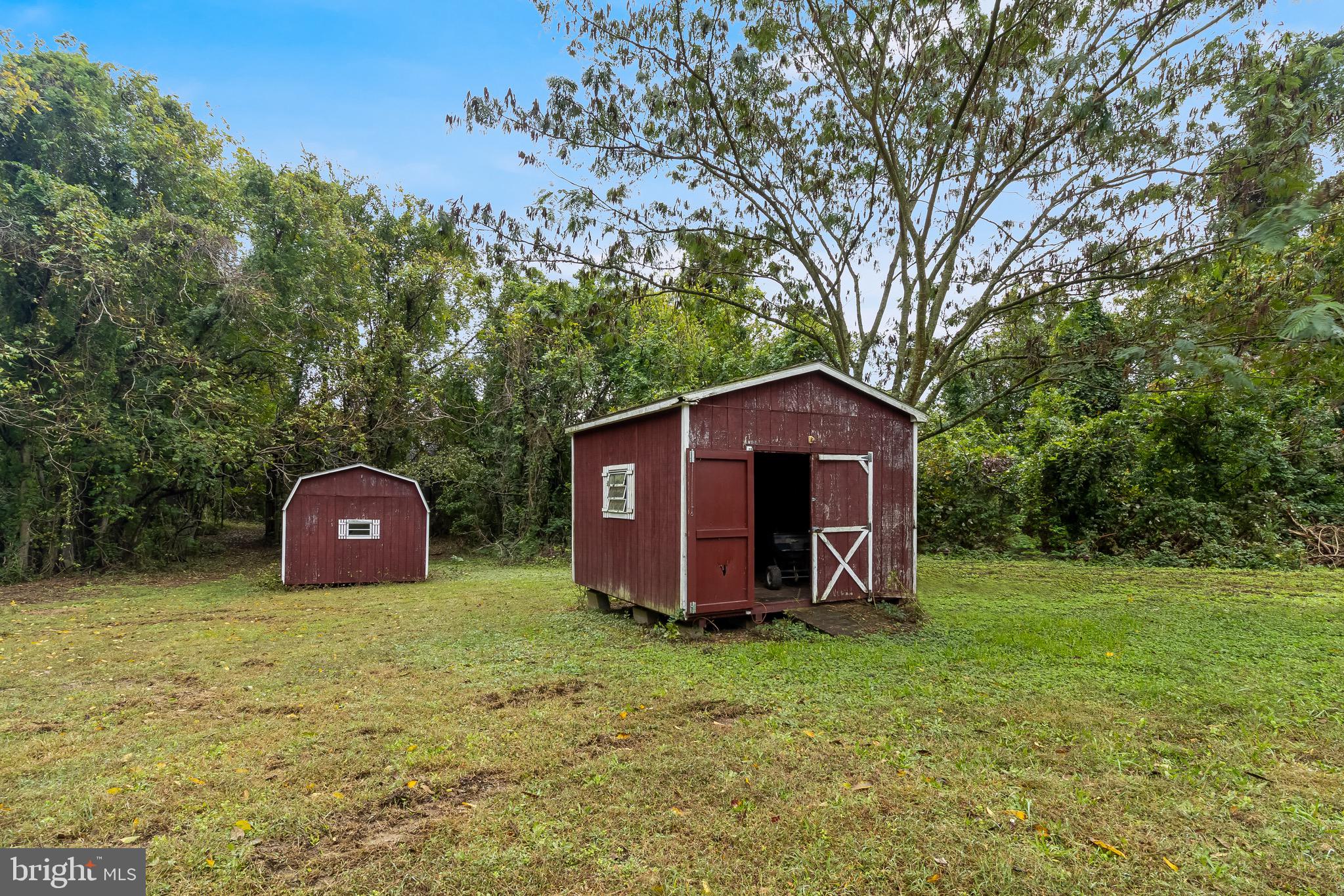 1940 Adelina Road Prince Frederick, MD 20678 - Photo 36 of 37 a view of a wooden house with a yard