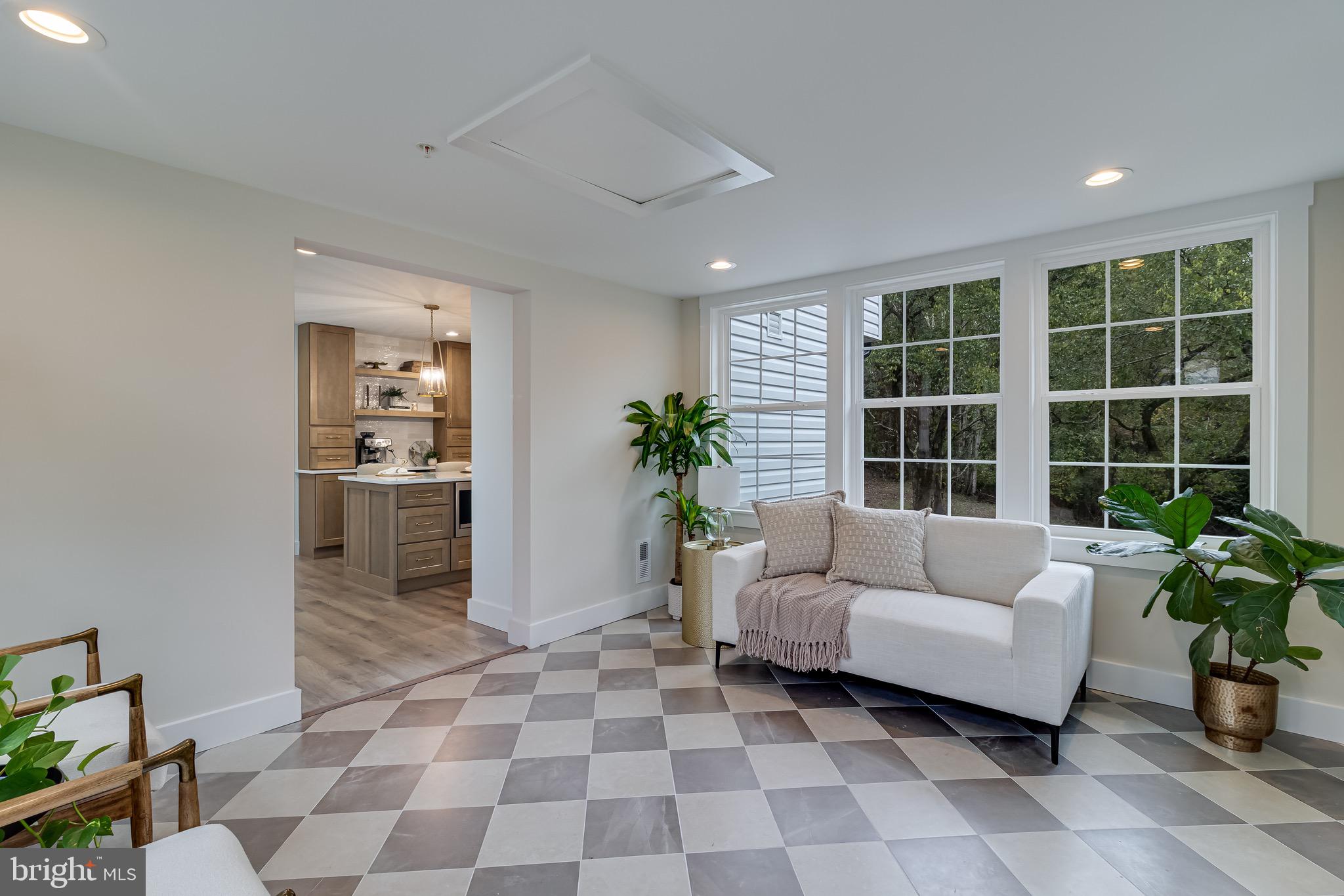 1940 Adelina Road Prince Frederick, MD 20678 - Photo 6 of 37 a living room with furniture and a potted plant