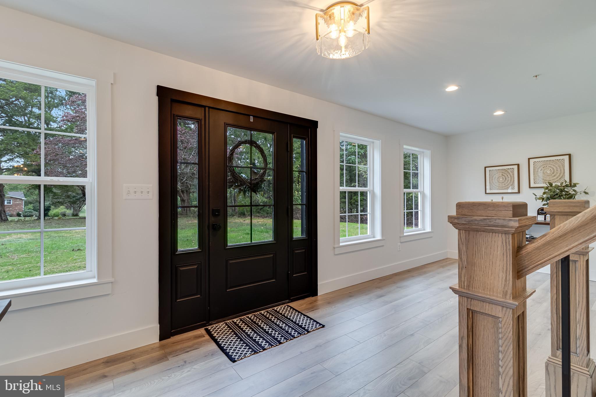 1940 Adelina Road Prince Frederick, MD 20678 - Photo 8 of 37 a view of a livingroom with furniture wooden floor and windows