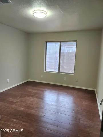 a bathroom with a sink a mirror and a toilet