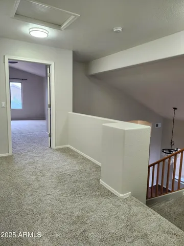 a view of hallway with stairs