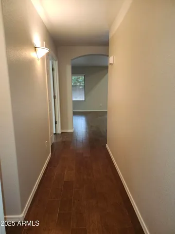 a view of kitchen with cabinets