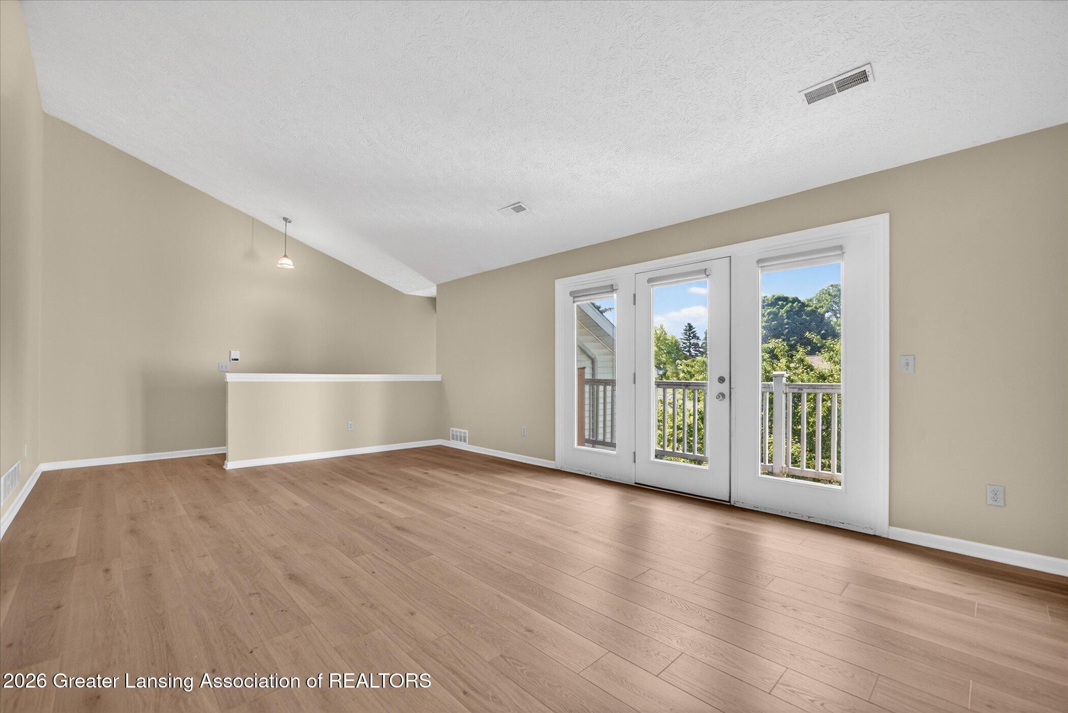 1337 Coolidge Road, Unit 16 East Lansing, MI 48823 - Photo 8 of 31 08-1337-Coolidge-Rd-WindowStill