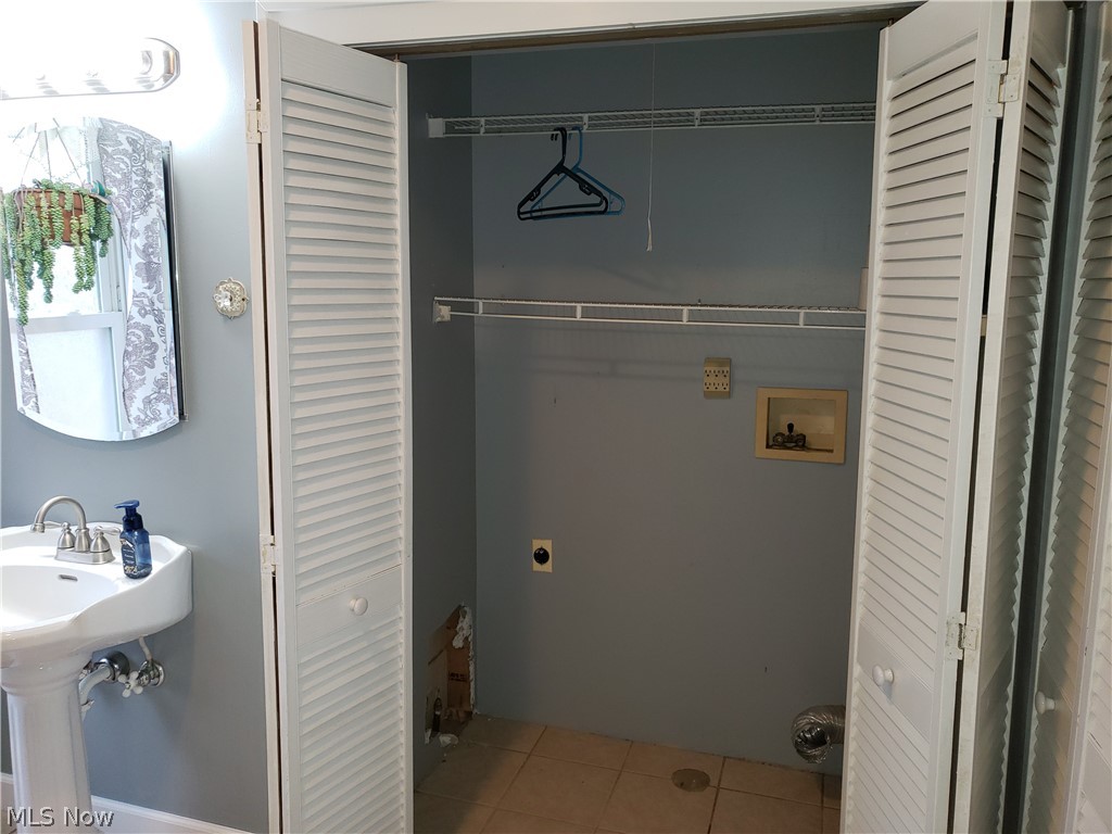 2163 Dock Road Madison, OH 44057 - Photo 23 of 35 main floor laundry area