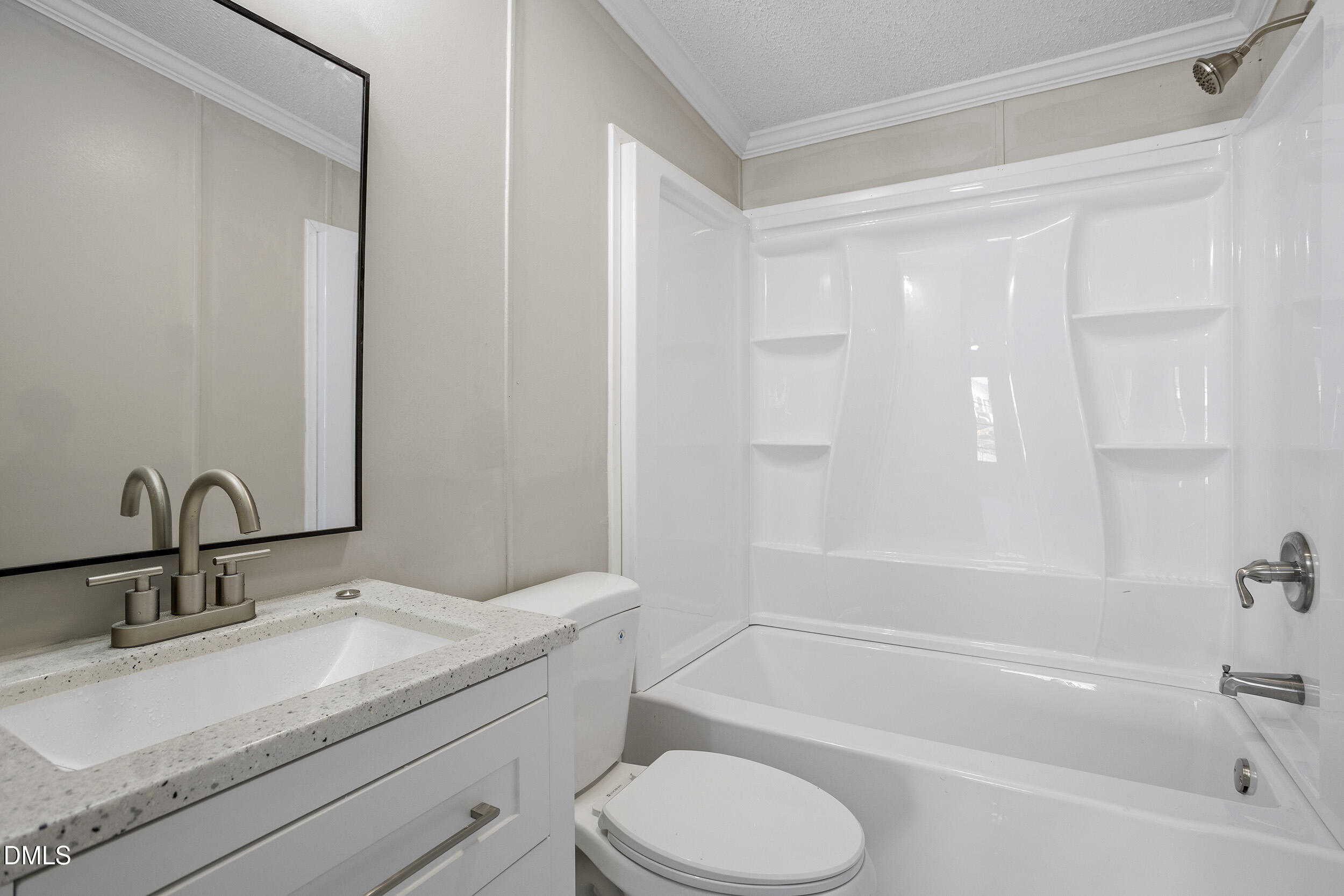 10965 Beaver Dam Road Middlesex, NC 27557 - Photo 14 of 24 a bathroom with a granite countertop sink toilet and shower