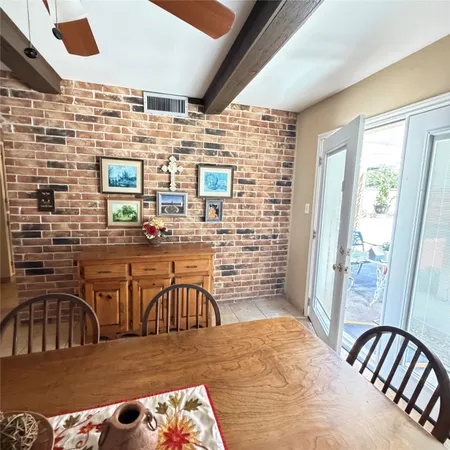 a balcony view with couple of chairs