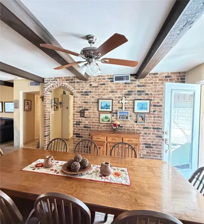 a room with lots of table and chairs