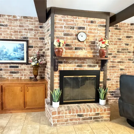 a stove top oven sitting inside of a kitchen