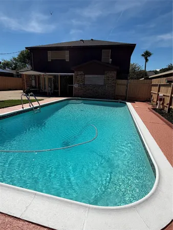 a view of a backyard with a tub