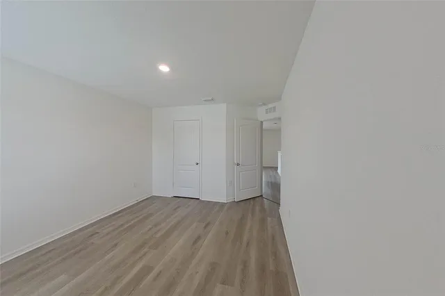 a view of an empty room and window