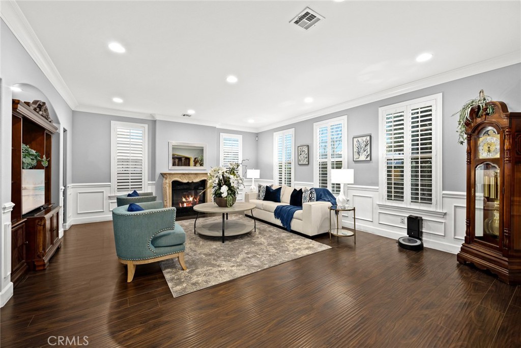 2641 Doolittle Avenue Arcadia, CA 91006 - Photo 7 of 13 a living room with fireplace furniture and a wooden floor
