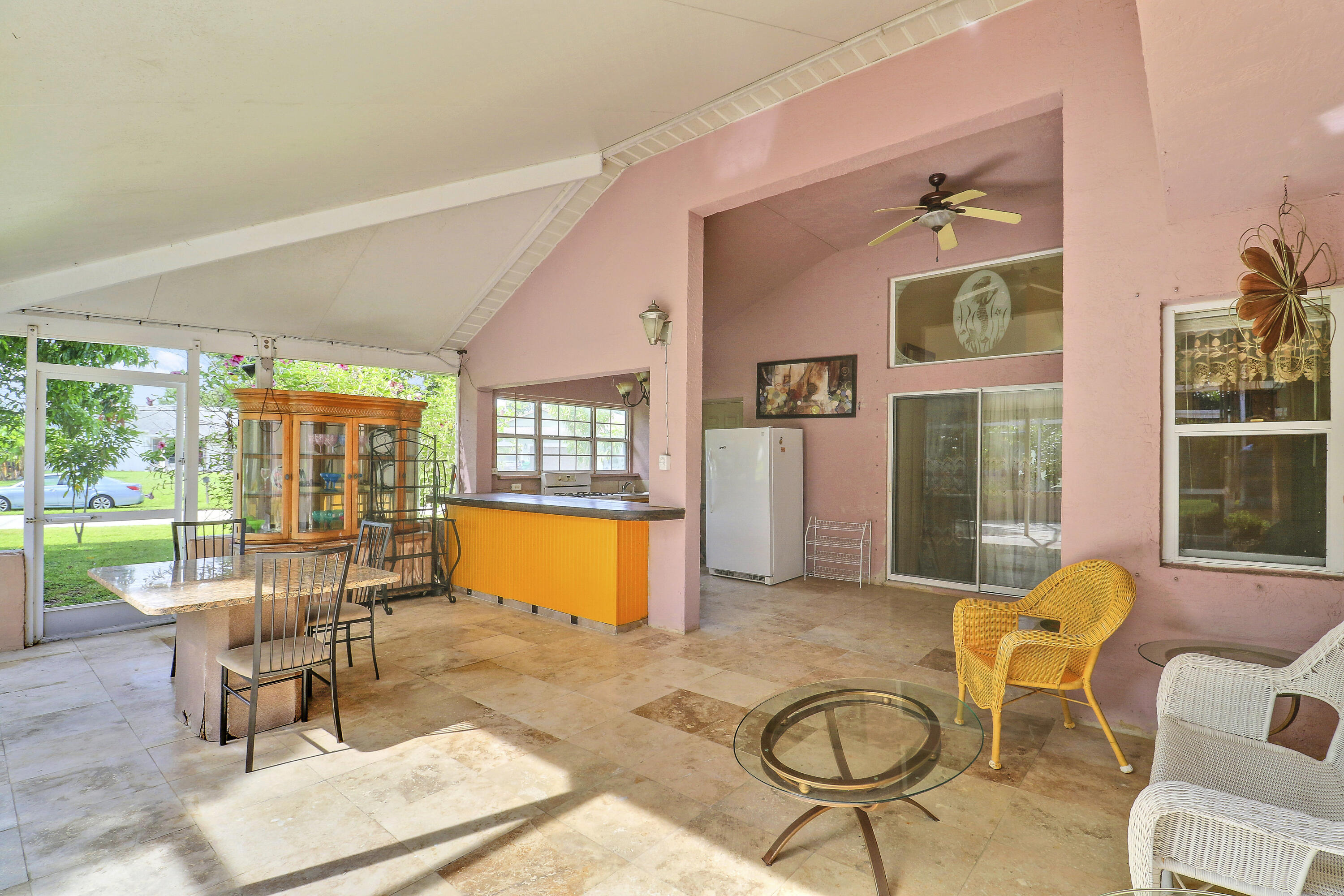 2085 Southwest Aladdin Street Port St. Lucie, FL 34953 - Photo 38 of 45 a living room with furniture a floor to ceiling window and floor to ceiling window