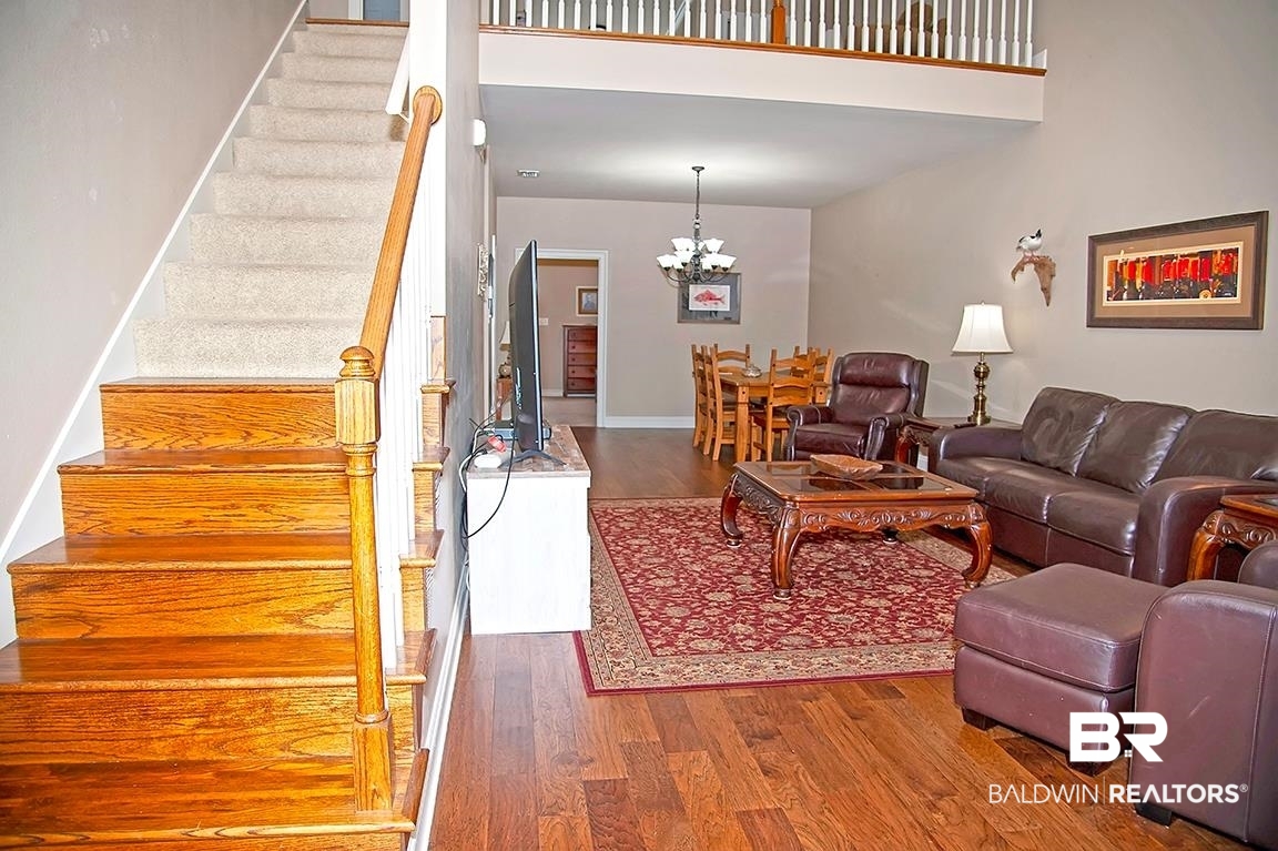 6580 Spaniel Drive Daphne, AL 36527 - Photo 9 of 34 Living room-Stairs