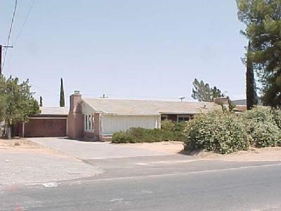 13733 Navajo Road Apple Valley, CA 92307 - Photo 1 of 1 a view of a house with a street
