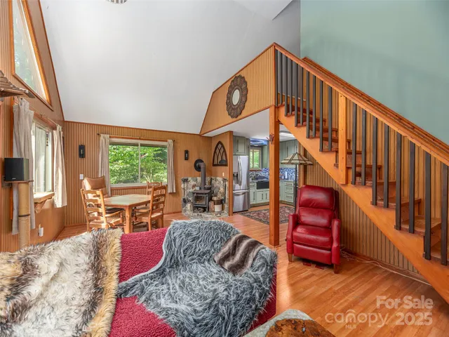 a living room with furniture or couch and a large window