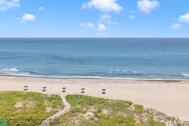 a view of a swimming pool and an outdoor space