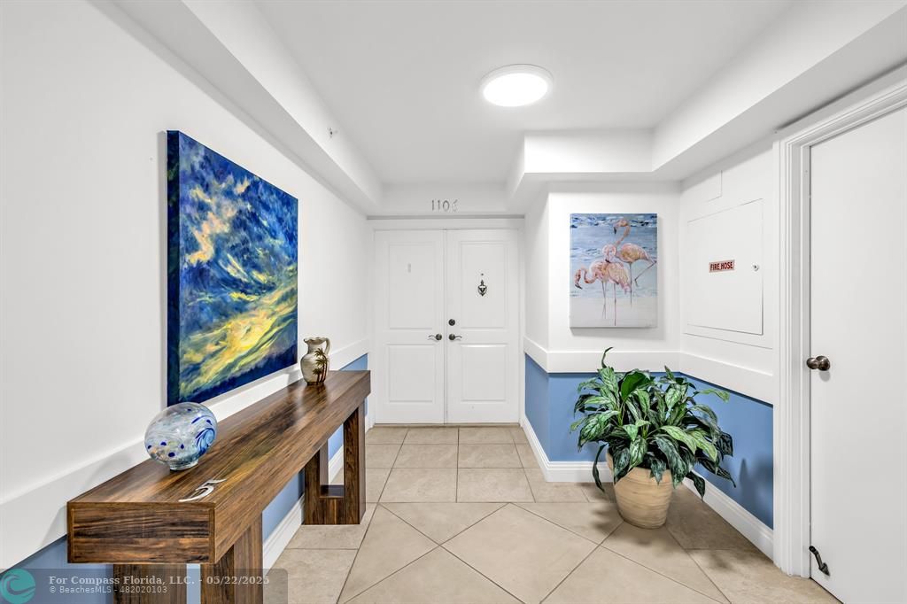 3000 South Ocean Boulevard, Unit 1106 Boca Raton, FL 33432 - Photo 30 of 30 a living room with furniture and flowers