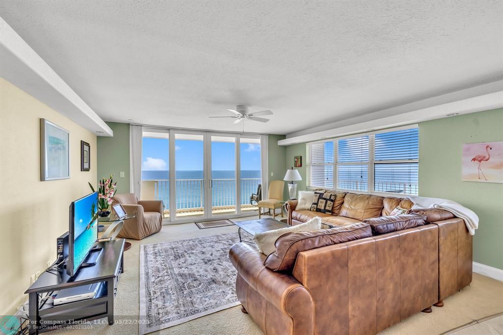 3000 South Ocean Boulevard, Unit 1106 Boca Raton, FL 33432 - Photo 7 of 30 a living room with furniture and a large window