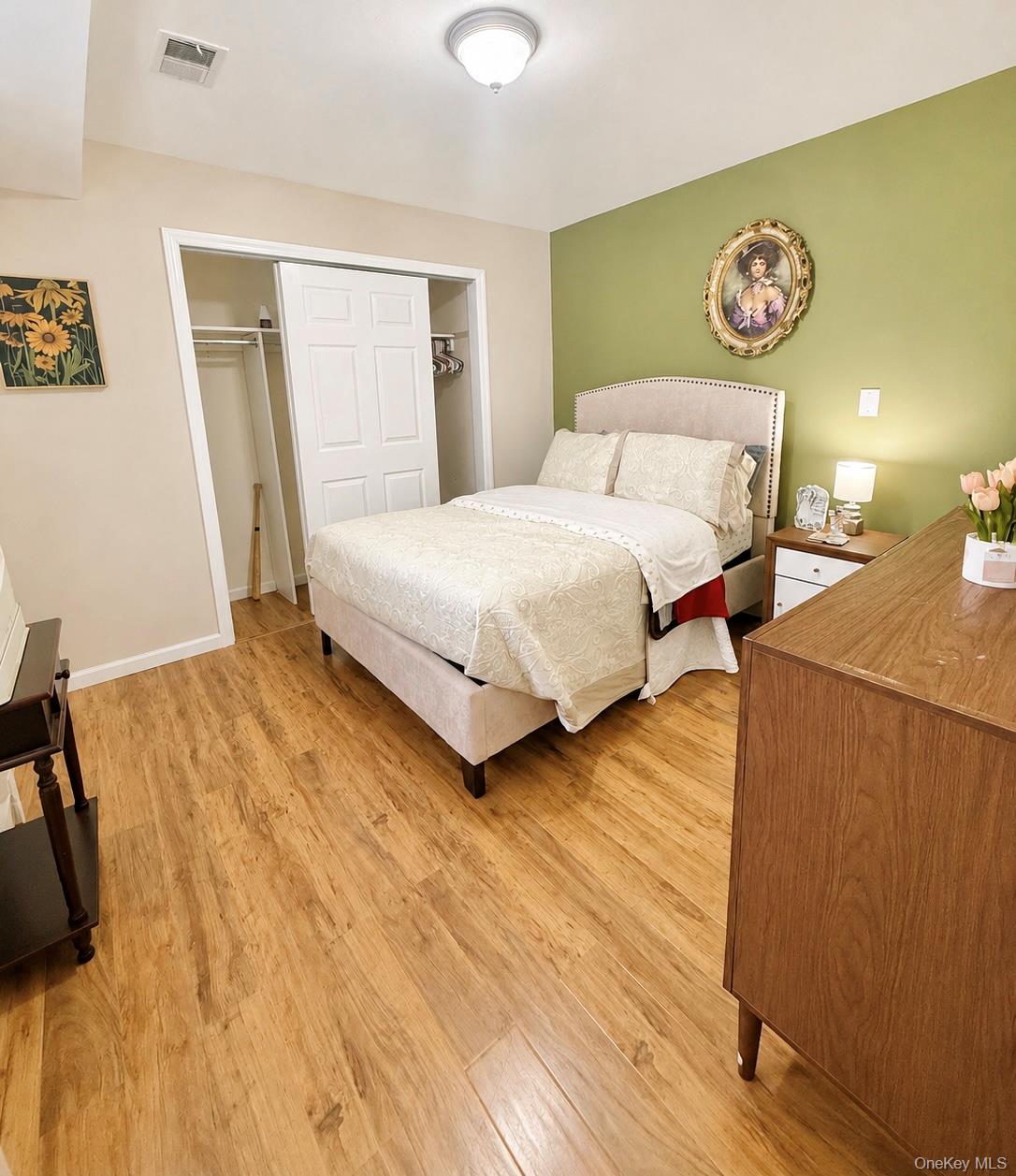 25 Rosman Road Thiells, NY 10984 - Photo 10 of 11 a bedroom with a bed and wooden floor