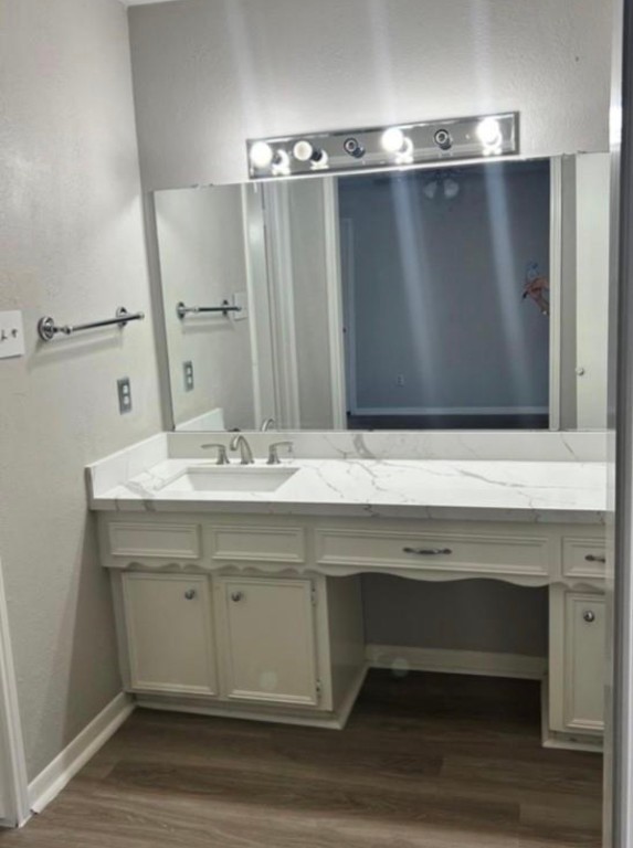 4515 Seneca Street Pasadena, TX 77504 - Photo 13 of 18 a bathroom with a sink and a mirror