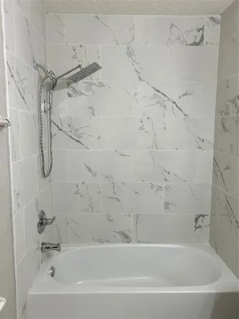 a bathroom with a bathtub