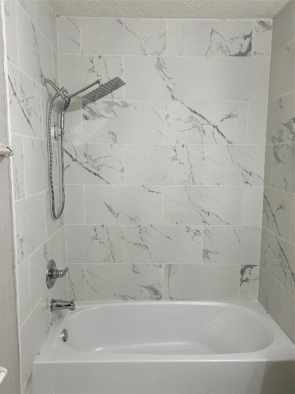 4515 Seneca Street Pasadena, TX 77504 - Photo 10 of 18 a bathroom with a bathtub