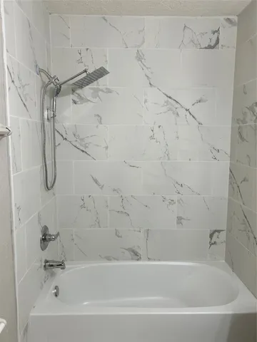 a bathroom with a bathtub