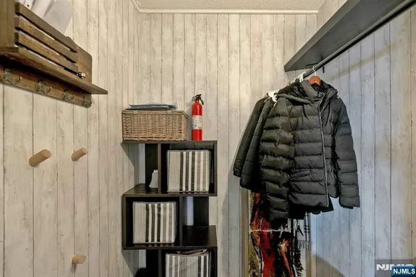 a spacious bedroom with a bed and a couch