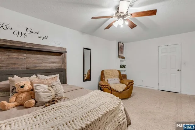 a bathroom with a sink a mirror and a shower