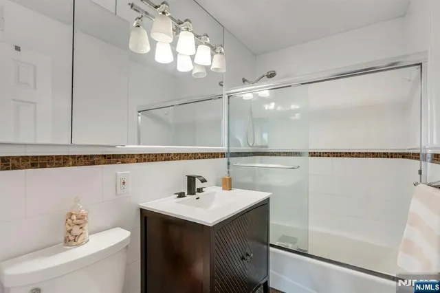 an aerial view of residential building and lake view