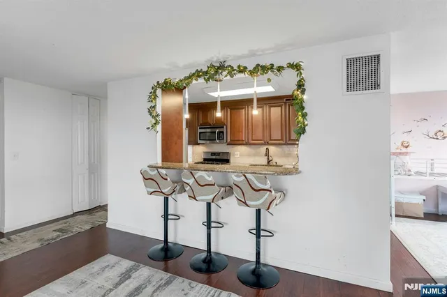 a view of a livingroom with furniture and window
