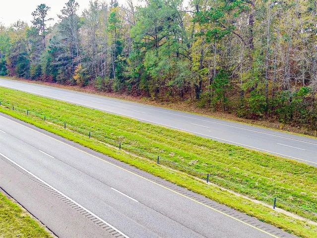 a sign that is on the side of a road