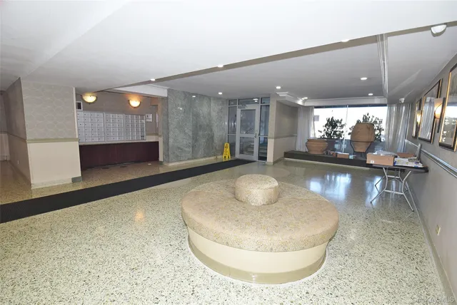 a view of a living room and kitchen